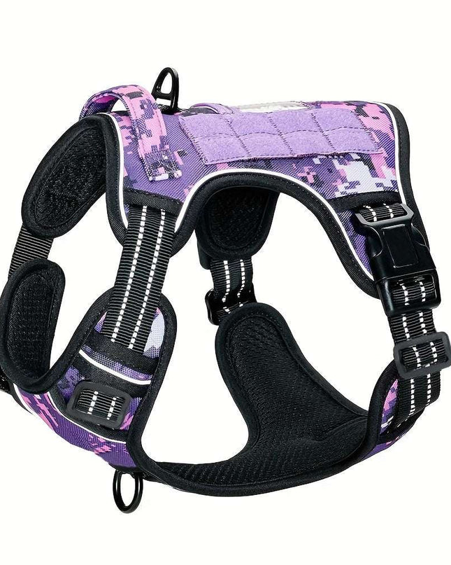 Military-style polyester vest for dogs in purple camo design, featuring durable straps and a control handle.