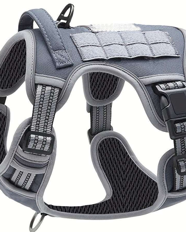 Military-style polyester dog vest, durable and reflective with control handle, adjustable for comfort and safety.