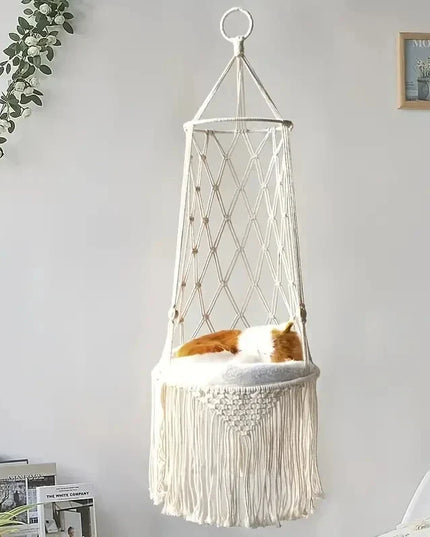Cat hammock hanging bed with cotton mat in a boho handwoven design, featuring tassels, ideal for cats to lounge, play, and climb.