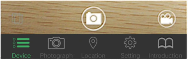 User interface of Pet Smart GPS Tracker mobile app showing options like photograph, location, and settings on a wooden background.
