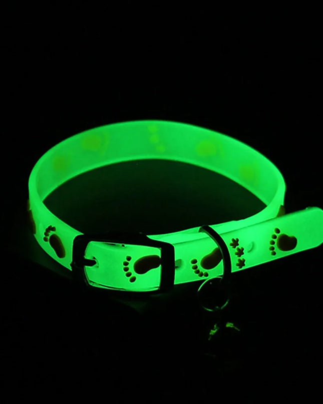 Luminous Cat Necklace glowing in the dark, made of durable fluorescent silicone with a small bell.