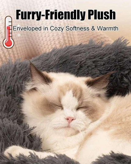 Fluffy cat sleeping in a cozy, plush pet bed highlighting furry-friendly warmth and softness.